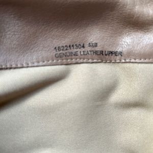 Gray leather knee high boots